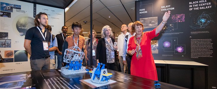 Ewine van Dishoeck at the IAU 100th Anniversary Open-source Exhibition